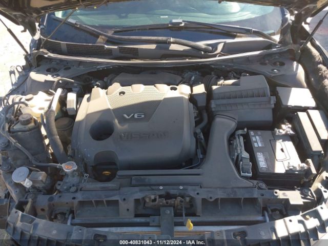 1N4AA6AP1GC377595 Nissan Maxima 3.5 Sl
