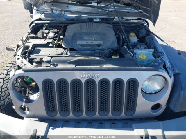 1C4AJWAG9EL209551 Jeep Wrangler Sport