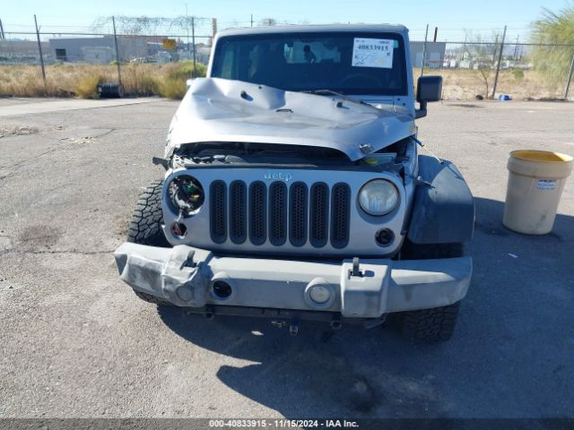 1C4AJWAG9EL209551 Jeep Wrangler Sport
