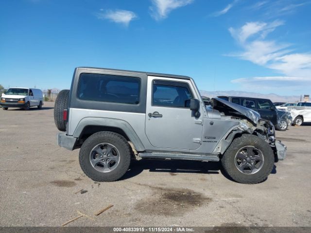 1C4AJWAG9EL209551 Jeep Wrangler Sport