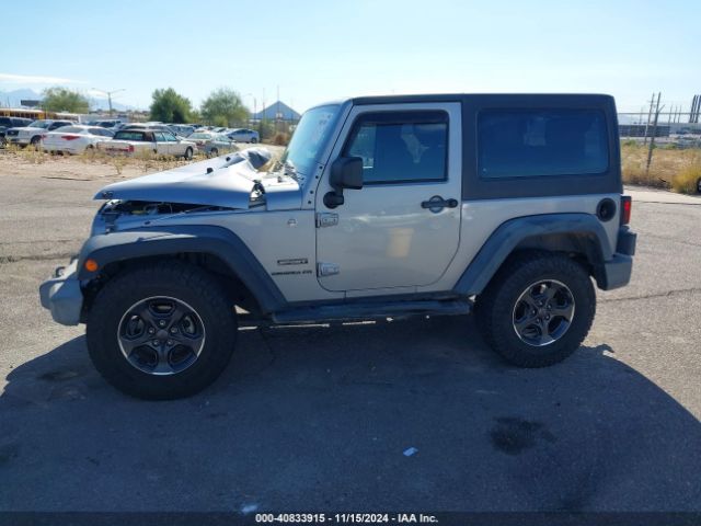 1C4AJWAG9EL209551 Jeep Wrangler Sport