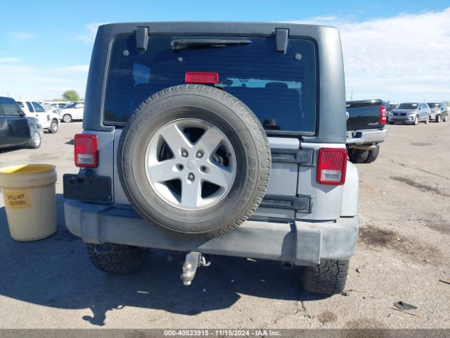 1C4AJWAG9EL209551 Jeep Wrangler Sport