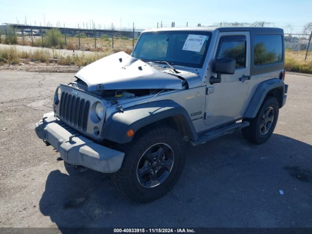 1C4AJWAG9EL209551 Jeep Wrangler Sport