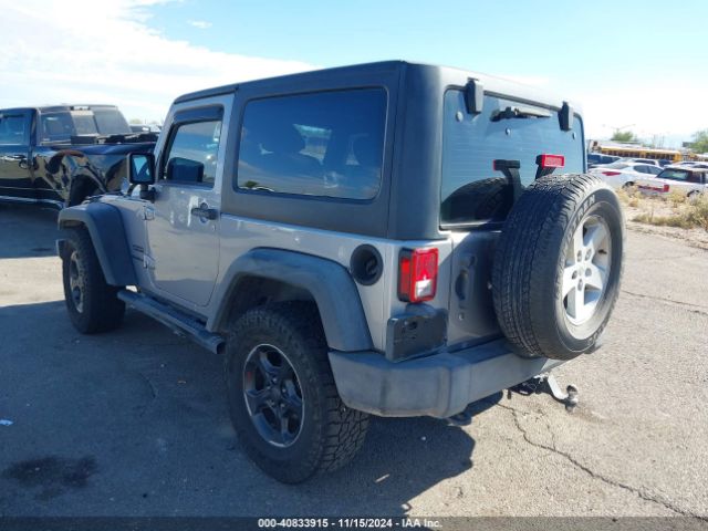 1C4AJWAG9EL209551 Jeep Wrangler Sport