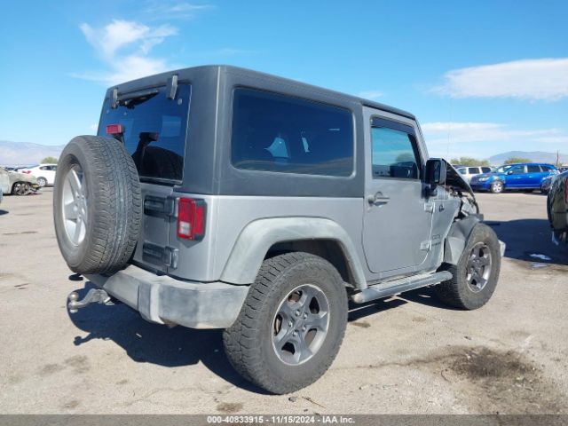 1C4AJWAG9EL209551 Jeep Wrangler Sport