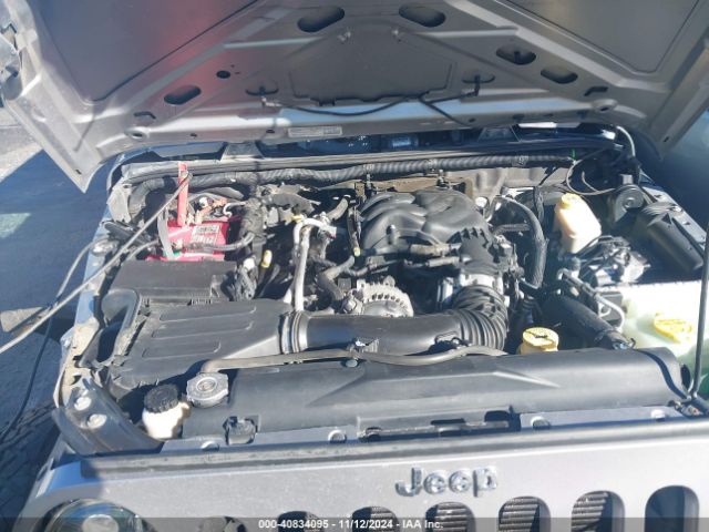 1C4BJWDG2EL243833 Jeep Wrangler Unlimited Sport
