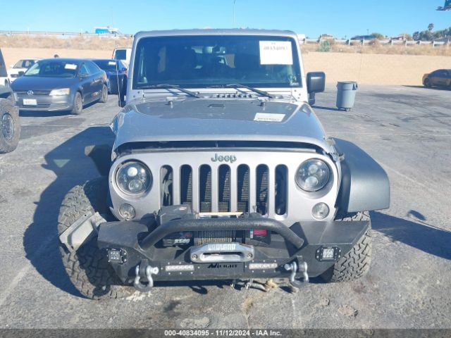 1C4BJWDG2EL243833 Jeep Wrangler Unlimited Sport