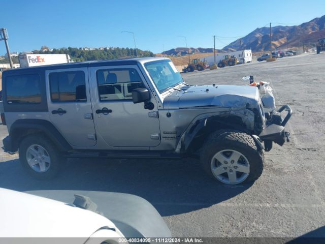 1C4BJWDG2EL243833 Jeep Wrangler Unlimited Sport