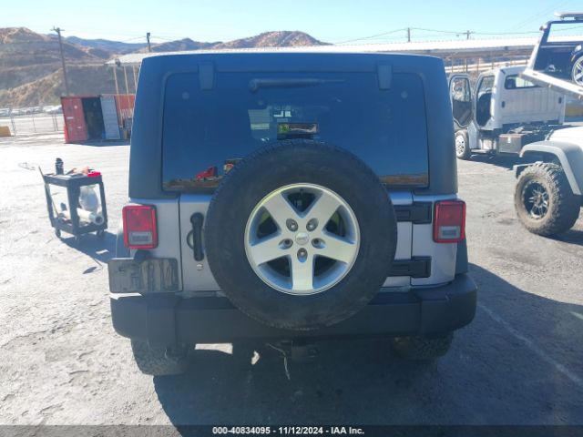 1C4BJWDG2EL243833 Jeep Wrangler Unlimited Sport