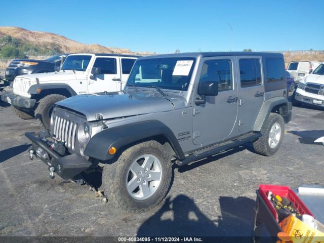 1C4BJWDG2EL243833 Jeep Wrangler Unlimited Sport