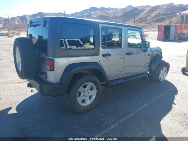 1C4BJWDG2EL243833 Jeep Wrangler Unlimited Sport