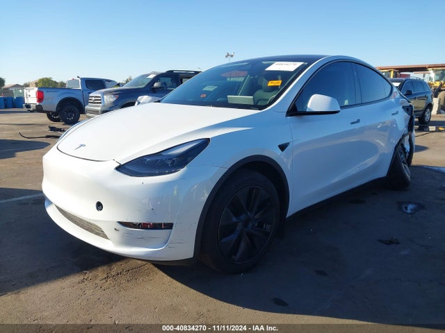 2024 TESLA MODEL Y 7SAYGDED1RF098104 Photo 1
