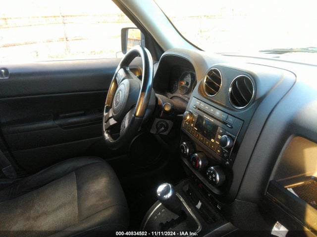1C4NJRFB0ED799097 Jeep Patriot Latitude