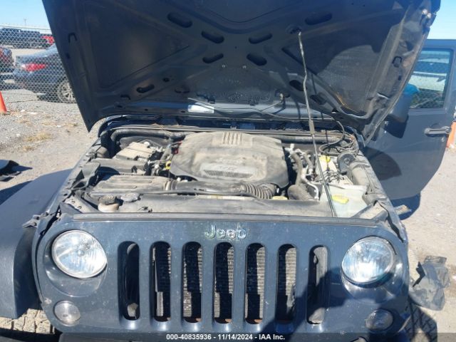 1C4HJWDGXGL311552 Jeep Wrangler Unlimited Sport