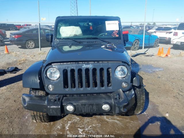 1C4HJWDGXGL311552 Jeep Wrangler Unlimited Sport