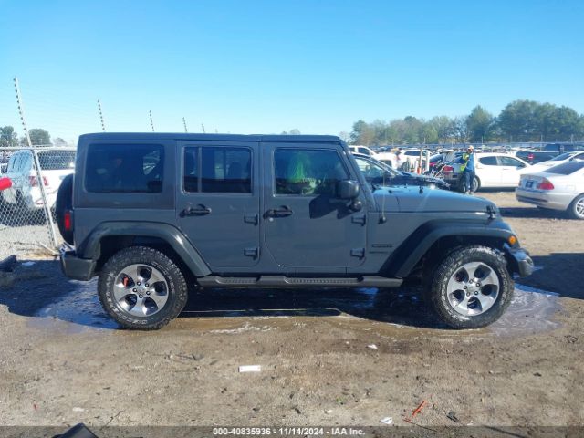 1C4HJWDGXGL311552 Jeep Wrangler Unlimited Sport