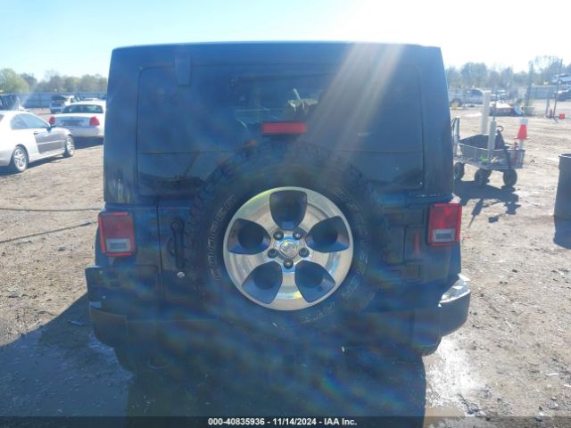 1C4HJWDGXGL311552 Jeep Wrangler Unlimited Sport