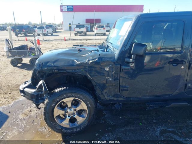 1C4HJWDGXGL311552 Jeep Wrangler Unlimited Sport