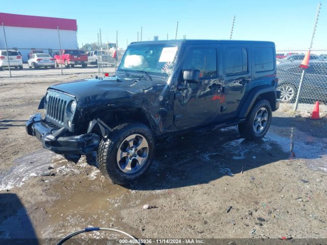 1C4HJWDGXGL311552 Jeep Wrangler Unlimited Sport