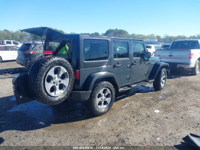 1C4HJWDGXGL311552 Jeep Wrangler Unlimited Sport