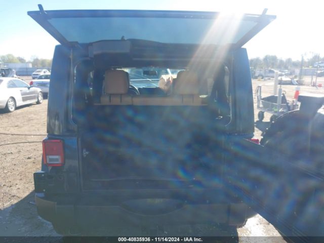 1C4HJWDGXGL311552 Jeep Wrangler Unlimited Sport