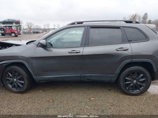1C4PJMCS4EW297911 Jeep Cherokee Altitude