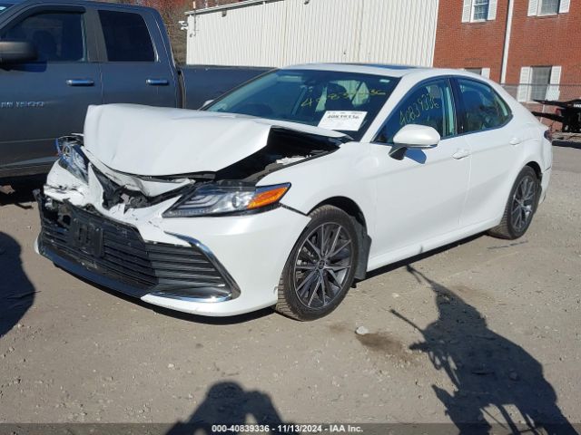 4T1F31AK4NU599424 Toyota Camry Xle Hybrid