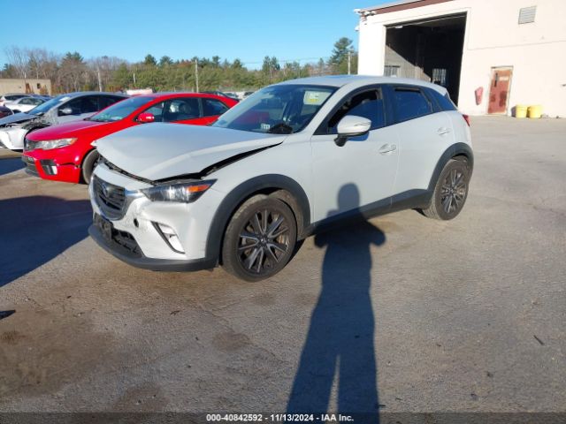 JM1DKFC72H0173392 Mazda Cx-3 Touring