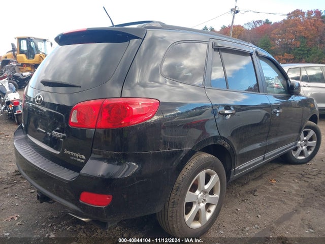 2009 Hyundai Santa Fe Limited მანქანა იყიდება აუქციონზე, vin: 5NMSH73E69H287701, აუქციონის ნომერი: 40844104