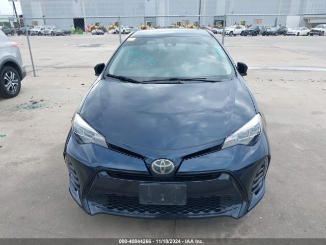 5YFBURHE1KP869104 Toyota COROLLA SE