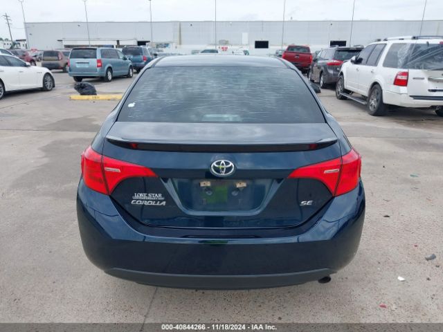 5YFBURHE1KP869104 Toyota COROLLA SE