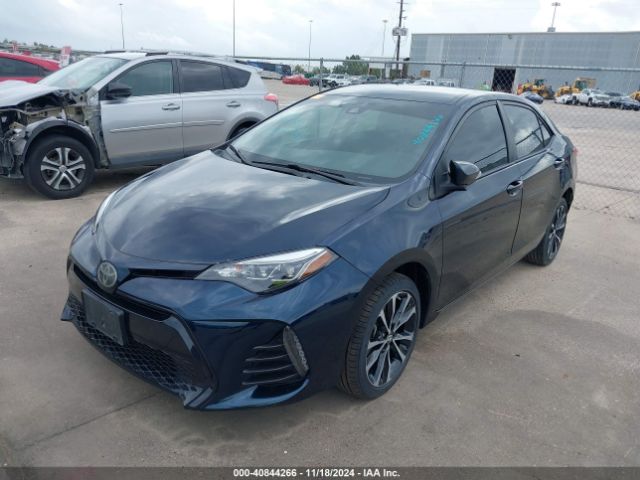 5YFBURHE1KP869104 Toyota COROLLA SE