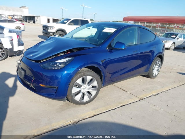 2024 TESLA MODEL Y 7SAYGDEE4RA278182 Photo 1