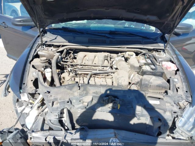 1FAHP2D87FG107000 Ford TAURUS SE