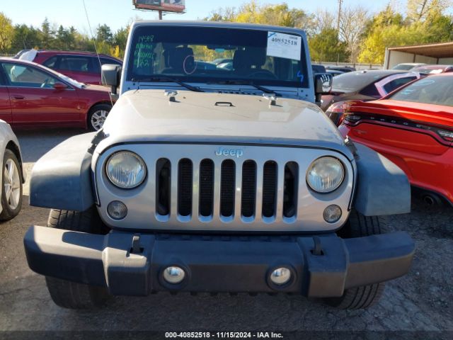 1C4BJWDG9EL209016 Jeep Wrangler Unlimited Sport
