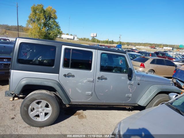 1C4BJWDG9EL209016 Jeep Wrangler Unlimited Sport