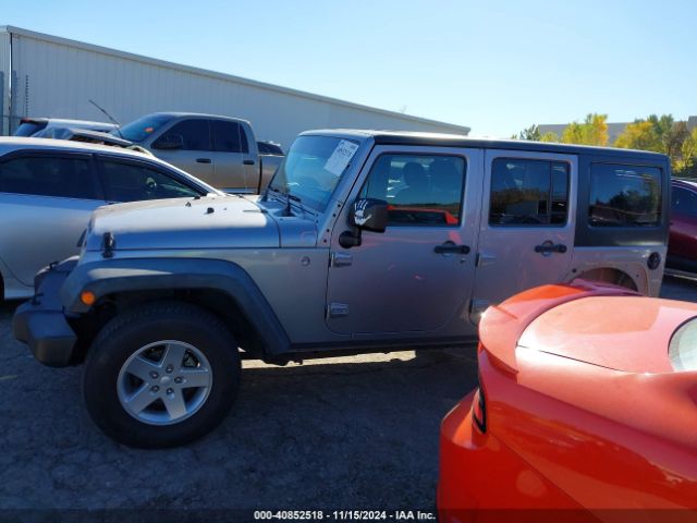 1C4BJWDG9EL209016 Jeep Wrangler Unlimited Sport