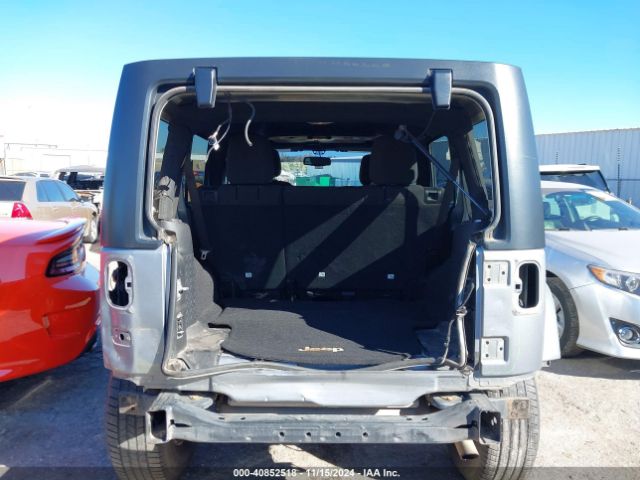 1C4BJWDG9EL209016 Jeep Wrangler Unlimited Sport