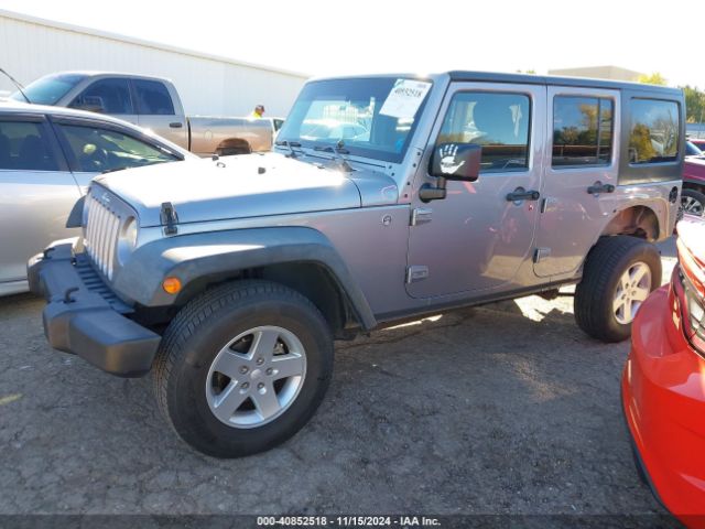 1C4BJWDG9EL209016 Jeep Wrangler Unlimited Sport