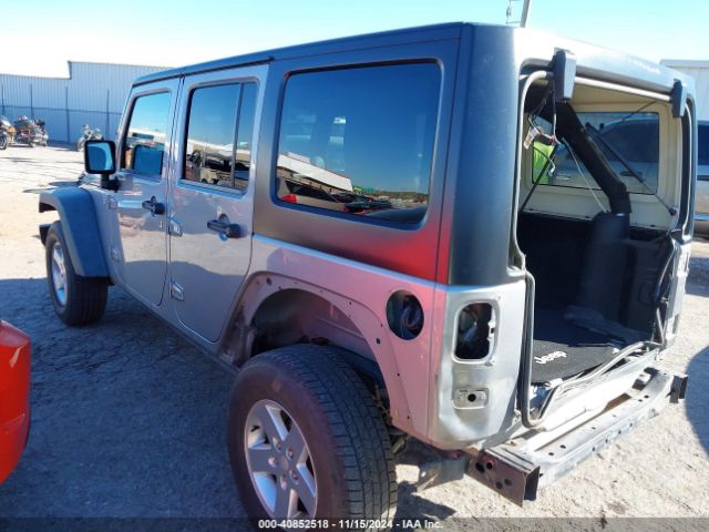 1C4BJWDG9EL209016 Jeep Wrangler Unlimited Sport