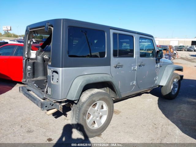 1C4BJWDG9EL209016 Jeep Wrangler Unlimited Sport