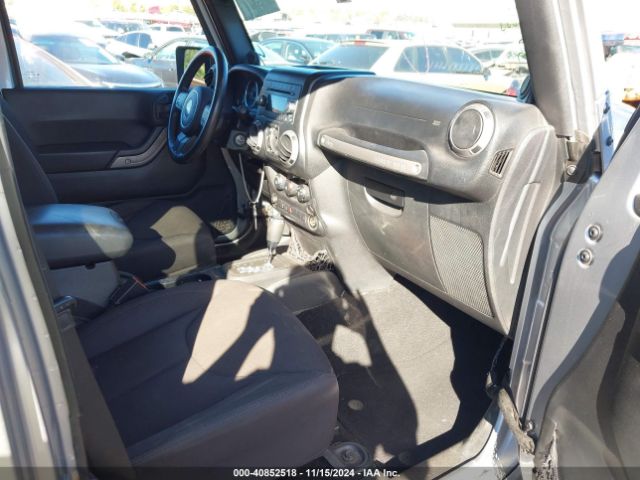 1C4BJWDG9EL209016 Jeep Wrangler Unlimited Sport