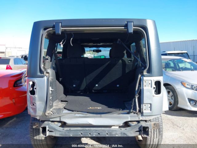 1C4BJWDG9EL209016 Jeep Wrangler Unlimited Sport