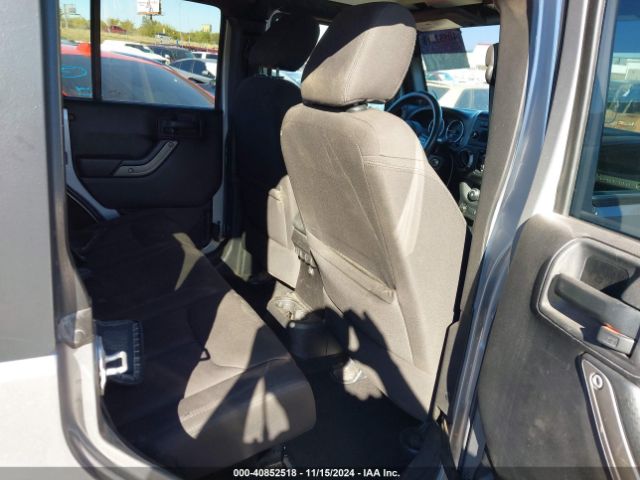 1C4BJWDG9EL209016 Jeep Wrangler Unlimited Sport