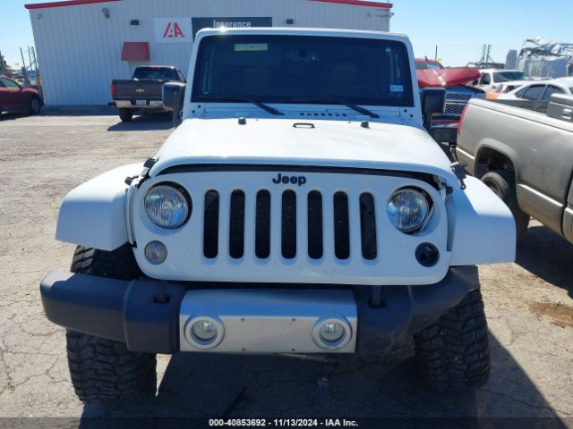 1C4BJWEG9FL614065 Jeep Wrangler Unlimited Sahara