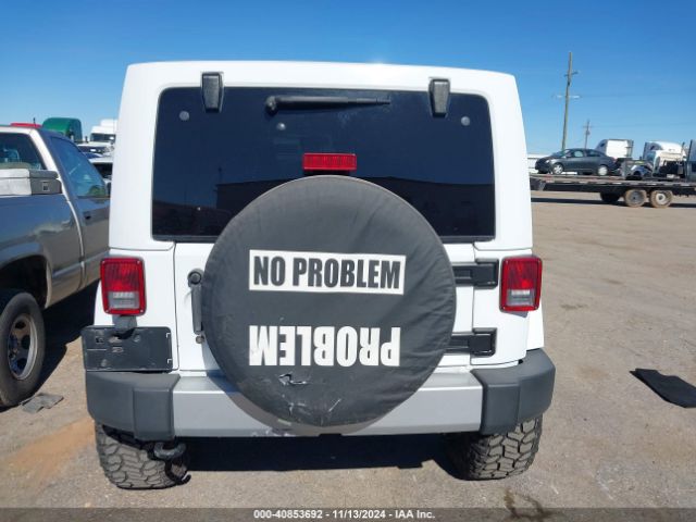 1C4BJWEG9FL614065 Jeep Wrangler Unlimited Sahara