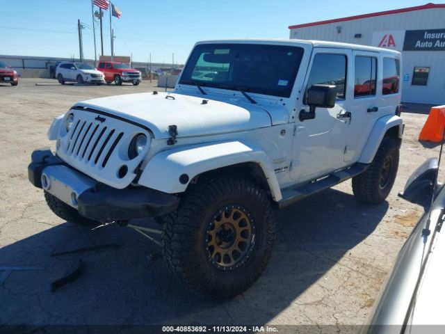 1C4BJWEG9FL614065 Jeep Wrangler Unlimited Sahara