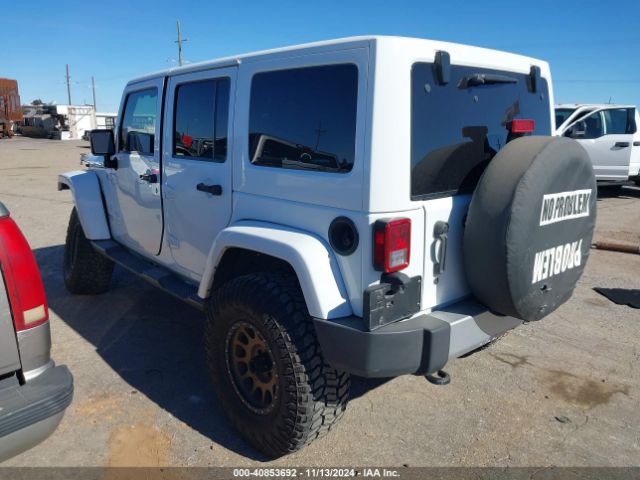 1C4BJWEG9FL614065 Jeep Wrangler Unlimited Sahara