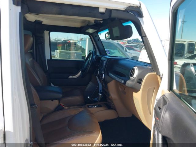 1C4BJWEG9FL614065 Jeep Wrangler Unlimited Sahara