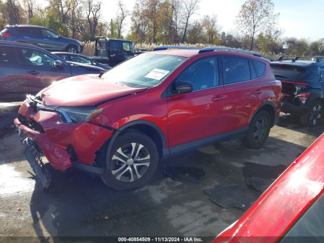 2016 TOYOTA RAV4 JTMBFREV2GJ092569 Photo 1